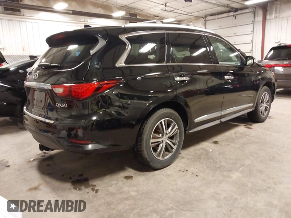 2017 Infiniti QX60 with VIN 5N1DL0MM5HC505169, listed as a IAAI auction lot 41879415 with 304,995 mi miles and . Bid and sale history available at DreamBid. Image 4.