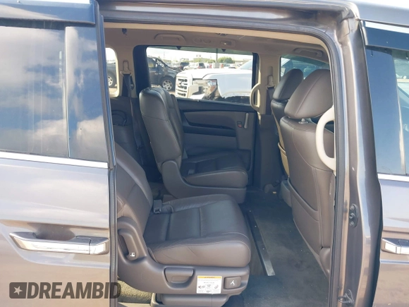 2011 Honda Odyssey Touring with VIN 5FNRL5H93BB104436, listed as a IAAI auction lot 40426003 with 93,342 mi miles and . Bid and sale history available at DreamBid. Image 8.