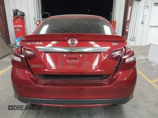 2018 Nissan Altima SR with VIN 1N4AL3AP4JC120138, listed as a IAAI auction lot 42111389 with 69,939 mi miles and . Bid and sale history available at carsss.com. Image 16.