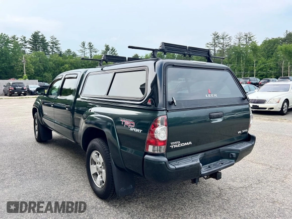 2009 Toyota Tacoma with VIN 3TMMU52N99M009737, listed as a Copart auction lot 60346815 with 216,703 mi miles and Clean title. Bid and sale history available at DreamBid. Image 3.