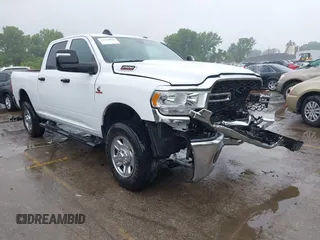 2023 Ram 2500 Tradesman with VIN 3C6UR5CLXPG617834, listed as a IAAI auction lot 42310966 with 180,192 mi miles and . Bid and sale history available at DreamBid. Image 1.