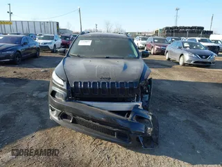 2016 Jeep Cherokee Latitude with VIN 1C4PJMCB1GW153316, listed as a IAAI auction lot 41430871 with 107,684 mi miles and . Bid and sale history available at carsss.com. Image 13.