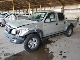 2003 Toyota Tacoma PreRunner z VIN 5TEGN92N63Z196608, wystawiony jako Copart lot #59019135 z przebiegiem 310 312 mil mil oraz Szkoda całkowita • Salvage title. Historia ofert i sprzedaży dostępna na DreamBid. Obrazek 1.