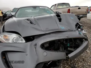 2011 Jaguar XK with VIN SAJWA4EC6BMB39972, listed as a Copart auction lot 70690864 with 98,364 mi miles and Salvage Title. Bid and sale history available at carsss.com. Image 5.