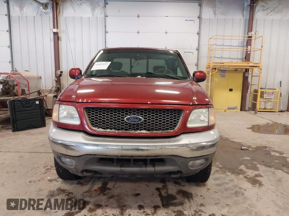 2003 Ford F-150 XL with VIN 1FTRX18L33NB82694, listed as a IAAI auction lot 41612431 with 179,664 mi miles. Bid and sale history available at carsss.com. Image 12.