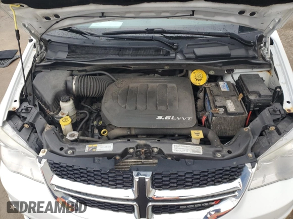 2014 Dodge Grand Caravan American Value with VIN 2C4RDGBG3ER280895, listed as a Copart auction lot 54351905 with 266,418 mi miles and Clean Title. Bid and sale history available at DreamBid. Image 12.