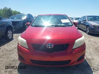 2009 Toyota Corolla with VIN JTDBL40E999080233, listed as a IAAI auction lot 41995330 with 249,789 mi miles. Bid and sale history available at carsss.com. Image 12.