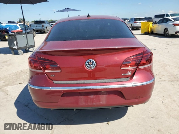 2014 Volkswagen CC Executive with VIN WVWGU7ANXEE526457, listed as a Copart auction lot 55958045 with 118,210 mi miles and Salvage title. Bid and sale history available at DreamBid. Image 6.