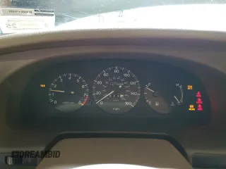 2000 Mazda Millenia z VIN JM1TA2212Y1610919, wystawiony jako Copart lot #80375014 z przebiegiem 127 938 mil mil oraz Szkody całkowita. Historia ofert i sprzedaży dostępna na DreamBid. Obrazek 9.