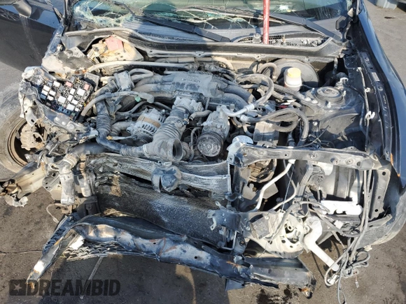 2015 Scion FR-S z VIN JF1ZNAA15F8712221, wystawiony jako Copart lot #58330515 z przebiegiem 108 646 mil mil oraz Szkoda całkowita • Salvage title. Historia ofert i sprzedaży dostępna na DreamBid. Obrazek 11.