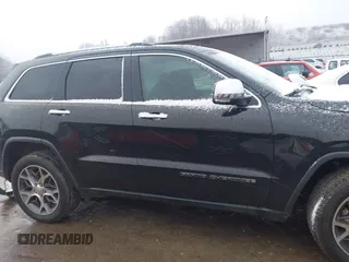 2021 Jeep Grand Cherokee 80th Anniversary with VIN 1C4RJFBG4MC510082, listed as a IAAI auction lot 41072125 with 55,610 mi miles and . Bid and sale history available at DreamBid. Image 14.