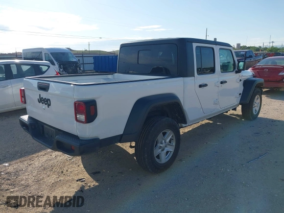 2023 Jeep Gladiator Sport S с VIN 1C6HJTAG0PL533933, выставлен на аукционе IAAI как лот 42351470 с пробегом 57 982 миль миль и . История ставок и продаж доступна на DreamBid. Изображение 4.