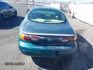 1996 Ford Taurus LX with VIN 1FALP53S0TG125665, listed as a IAAI auction lot 42290691 with 91,152 mi miles and . Bid and sale history available at DreamBid. Image 14.