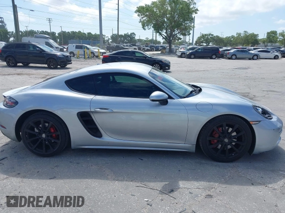 2017 Porsche Cayman S with VIN WP0AB2A87HS285634, listed as a IAAI auction lot 41949961 with 57,422 mi miles and . Bid and sale history available at DreamBid. Image 14.