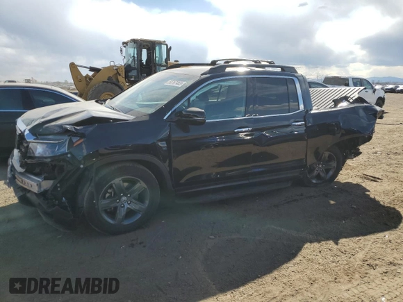 2023 Honda Ridgeline RTL-E with VIN 5FPYK3F71PB024149, listed as a Copart auction lot 50767465 with 40,943 mi miles and Salvage title. Bid and sale history available at DreamBid. Image 1.
