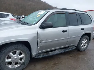 2006 GMC Envoy SLE z VIN 1GKDT13S562187698, wystawiony jako IAAI lot #41808778 z przebiegiem 167 023 mil mil oraz . Historia ofert i sprzedaży dostępna na DreamBid. Obrazek 6.