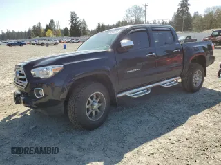 2018 Toyota Tacoma SR with VIN 3TMGZ5AN6JM163097, listed as a Copart auction lot 52633665 with 39,910 mi miles and Salvage Title. Bid and sale history available at DreamBid. Image 1.