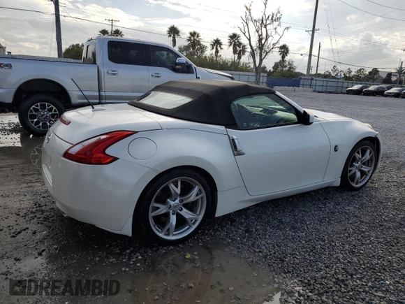 2010 Nissan 370Z Touring с VIN JN1AZ4FH2AM302093, выставлен на аукционе Copart как лот 86953624 с пробегом 138 845 миль миль и Списание • Salvage title. История ставок и продаж доступна на DreamBid. Изображение 3.