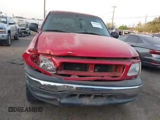 2001 Ford F-150 XLT with VIN 1FTRW07W61KF51667, listed as a IAAI auction lot 41846904 with 187,076 mi miles and . Bid and sale history available at DreamBid. Image 13.
