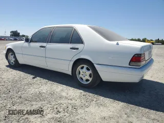 1997 Mercedes-Benz S-Class with VIN WDBGA33G2VA340711, listed as a Copart auction lot 52647695 with 90,224 mi miles and Salvage Title. Bid and sale history available at carsss.com. Image 2.