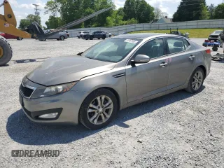 2012 Kia Optima EX z VIN 5XXGN4A72CG026217, wystawiony jako Copart lot #53957565 z przebiegiem 128 874 mil mil oraz Szkoda całkowita • Salvage title. Historia ofert i sprzedaży dostępna na DreamBid. Obrazek 1.