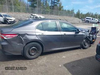 2019 Toyota Camry Hybrid LE z VIN 4T1B31HK0KU509265, wystawiony jako IAAI lot #42014204 z przebiegiem 136 560 mil mil oraz . Historia ofert i sprzedaży dostępna na DreamBid. Obrazek 13.