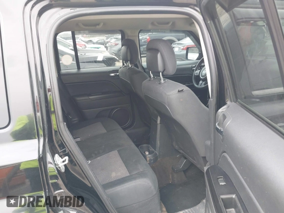 2014 Jeep Patriot Altitude with VIN 1C4NJPBA9ED505021, listed as a IAAI auction lot 41728734 with 142,385 mi miles and . Bid and sale history available at DreamBid. Image 8.