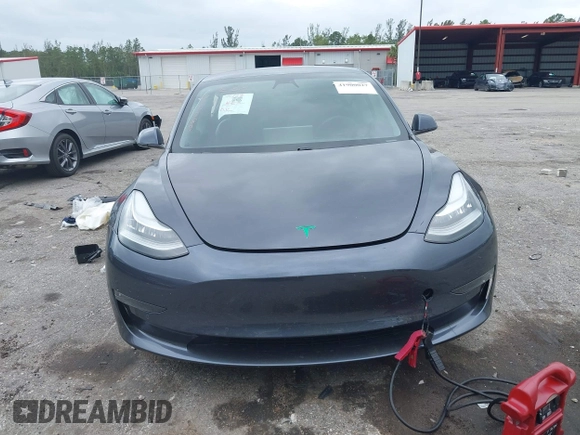 2021 Tesla Model 3 Long Range with VIN 5YJ3E1EBXMF836789, listed as a IAAI auction lot 41900027 with 71,086 mi miles. Bid and sale history available at carsss.com. Image 12.