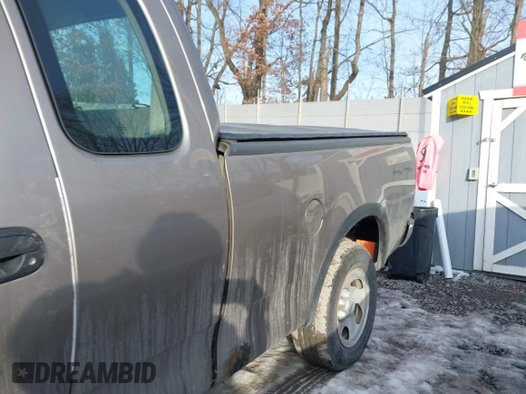 2003 Ford F-150 XL with VIN 2FTRX18W73CB07559, listed as a IAAI auction lot 41452402 with 152,509 mi miles. Bid and sale history available at carsss.com. Image 14.