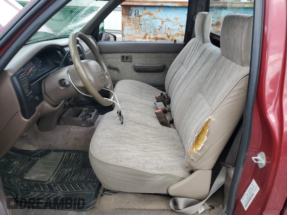 1999 Toyota Tacoma z VIN 4TANL42N4XZ435246, wystawiony jako Copart lot #56843025 z przebiegiem 197 295 mil mil oraz Szkoda całkowita • Salvage title. Historia ofert i sprzedaży dostępna na DreamBid. Obrazek 7.