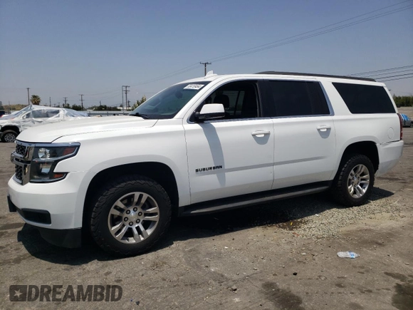 2019 Chevrolet Suburban LT with VIN 1GNSCHKCXKR207233, listed as a Copart auction lot 55410464 with 107,500 mi miles and Salvage Title. Bid and sale history available at DreamBid. Image 1.