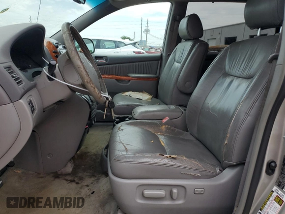 2012 Toyota Sienna XLE AAS with VIN 5TDYK3DC6CS275537, listed as a Copart auction lot 66040605 with 135,148 mi miles and Clean title. Bid and sale history available at DreamBid. Image 7.