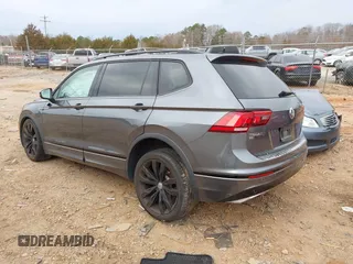 2020 Volkswagen Tiguan SE with VIN 3VV3B7AX7LM163193, listed as a IAAI auction lot 41751571 with 32,352 mi miles and . Bid and sale history available at DreamBid. Image 3.