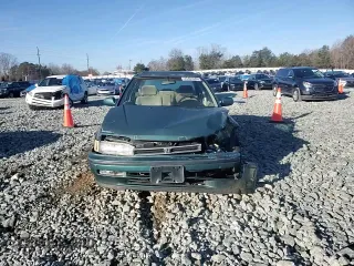 1992 Honda Accord z VIN 1HGCB7675NA166361, wystawiony jako Copart lot #45403685 z przebiegiem 384 361 mil mil oraz Szkoda całkowita • Salvage title. Historia ofert i sprzedaży dostępna na DreamBid. Obrazek 11.