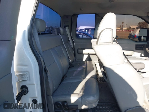 2004 Ford F-150 STX with VIN 1FTRX12WX4NC50607, listed as a IAAI auction lot 41990962 with 221,664 mi miles and . Bid and sale history available at carsss.com. Image 8.