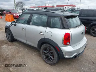 2011 MINI Countryman S with VIN WMWZC5C51BWM10385, listed as a IAAI auction lot 41952679 with 112,008 mi miles and . Bid and sale history available at DreamBid. Image 3.