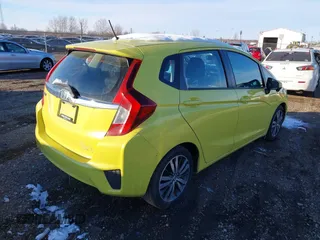 2015 Honda Fit EX-L z VIN 3HGGK5H84FM717976, wystawiony jako IAAI lot #38167874 z przebiegiem 110 963 mil mil oraz . Historia ofert i sprzedaży dostępna na DreamBid. Obrazek 4.