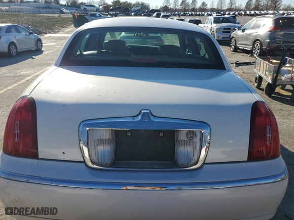 2000 Lincoln Town Car Executive with VIN 1LNHM81W3YY887532, listed as a Copart auction lot 83570574 with 164,105 mi miles and Salvage Title. Bid and sale history available at carsss.com. Image 6.