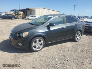 2014 Chevrolet Sonic LTZ with VIN 1G1JE5SB9E4103444, listed as a Copart auction lot 46949955 with 120,986 mi miles and Clean Title. Bid and sale history available at carsss.com. Image 1.