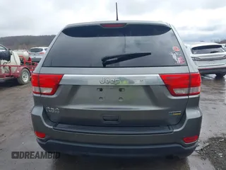 2012 Jeep Grand Cherokee Laredo with VIN 1C4RJFAGXCC118823, listed as a IAAI auction lot 41808398 with 153,509 mi miles. Bid and sale history available at carsss.com. Image 16.