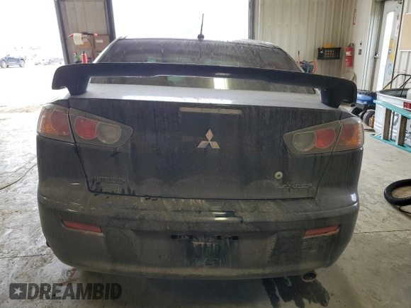 2015 Mitsubishi Lancer SE z VIN JA32V2FW5FU600675, wystawiony jako Copart lot #48720404 z przebiegiem 146 773 mil mil oraz Nie do naprawy • Non repairable. Historia ofert i sprzedaży dostępna na DreamBid. Obrazek 6.