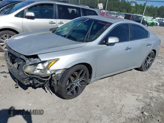 2012 Nissan Maxima SV z VIN 1N4AA5AP0CC862427, wystawiony jako IAAI lot #42043112 z przebiegiem 215 327 mil mil oraz . Historia ofert i sprzedaży dostępna na DreamBid. Obrazek 2.