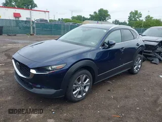 2022 Mazda CX-30 S Premium with VIN 3MVDMBDL0NM413545, listed as a IAAI auction lot 42493594 with 57,013 mi miles and . Bid and sale history available at DreamBid. Image 18.