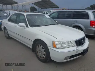 2004 Acura RL w/Navigation System z VIN JH4KA966X4C001584, wystawiony jako IAAI lot #42429042 z przebiegiem 290 258 mil mil oraz . Historia ofert i sprzedaży dostępna na DreamBid. Obrazek 1.