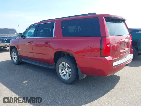 2015 Chevrolet Suburban LT with VIN 1GNSKJKC5FR726299, listed as a IAAI auction lot 42740904 with 96,700 mi miles and . Bid and sale history available at DreamBid. Image 3.