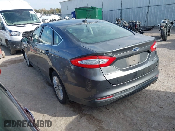 2015 Ford Fusion SE Hybrid with VIN 3FA6P0LUXFR266743, listed as a IAAI auction lot 40862039 with 116,610 mi miles. Bid and sale history available at carsss.com. Image 3.