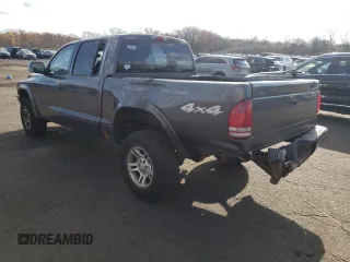 2004 Dodge Dakota Sport z VIN 1D7HG38N64S688604, wystawiony jako Copart lot #79811934 z przebiegiem 160 377 mil mil oraz Szkoda całkowita • Salvage title. Historia ofert i sprzedaży dostępna na DreamBid. Obrazek 2.