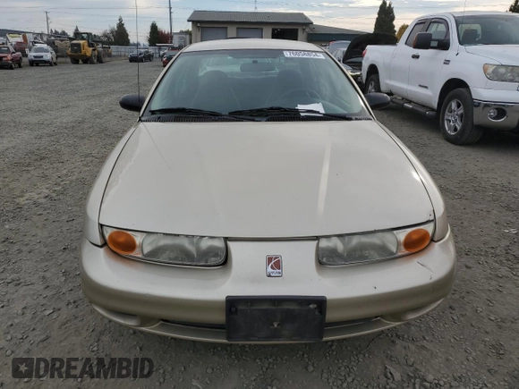 2001 Saturn SL z VIN 1G8ZH52831Z348124, wystawiony jako Copart lot #76058854 z przebiegiem 191 465 mil mil oraz Szkoda całkowita • Salvage title. Historia ofert i sprzedaży dostępna na DreamBid. Obrazek 5.