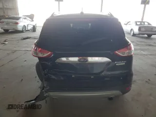2015 Ford Escape Titanium with VIN 1FMCU0J91FUA17918, listed as a Copart auction lot 64525025 with 130,095 mi miles and Salvage title. Bid and sale history available at DreamBid. Image 6.