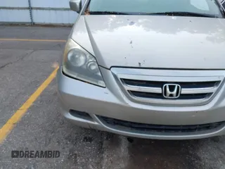 2005 Honda Odyssey EX-L with VIN 5FNRL38715B003399, listed as a IAAI auction lot 42589092 with 252,737 mi miles and . Bid and sale history available at DreamBid. Image 6.